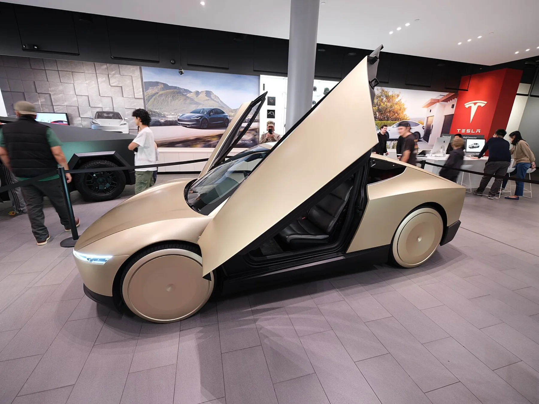 Oblique exterior view of the Tesla Cybercab at Santana Row.